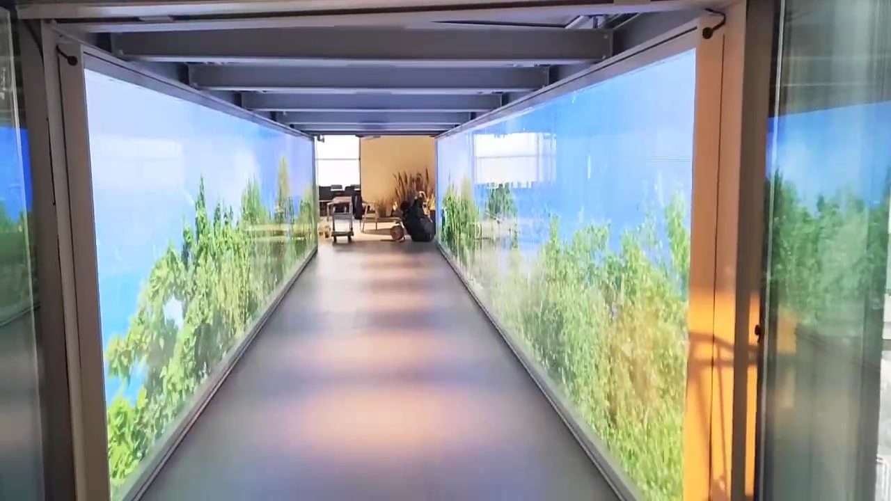 Retail window display running bright LED content on transparent film