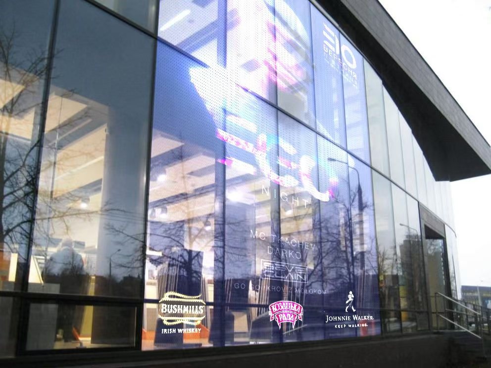 Stick and play installation on street-front glazing